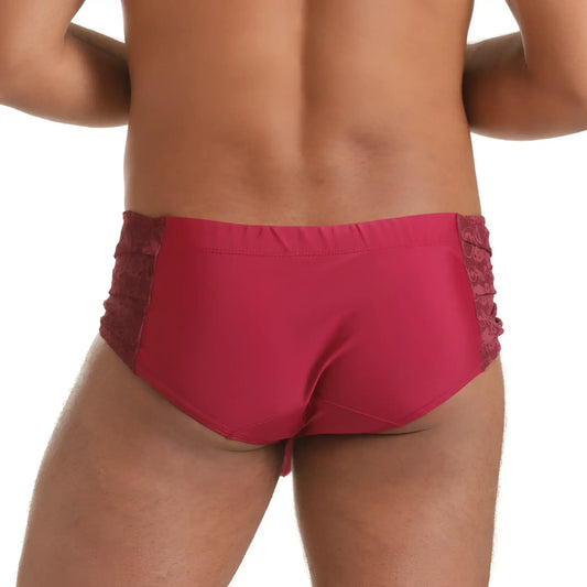 Red lace-trimmed briefs in satin-like fabric designed as gigo hindu wine swim brief for stylish swimwear use