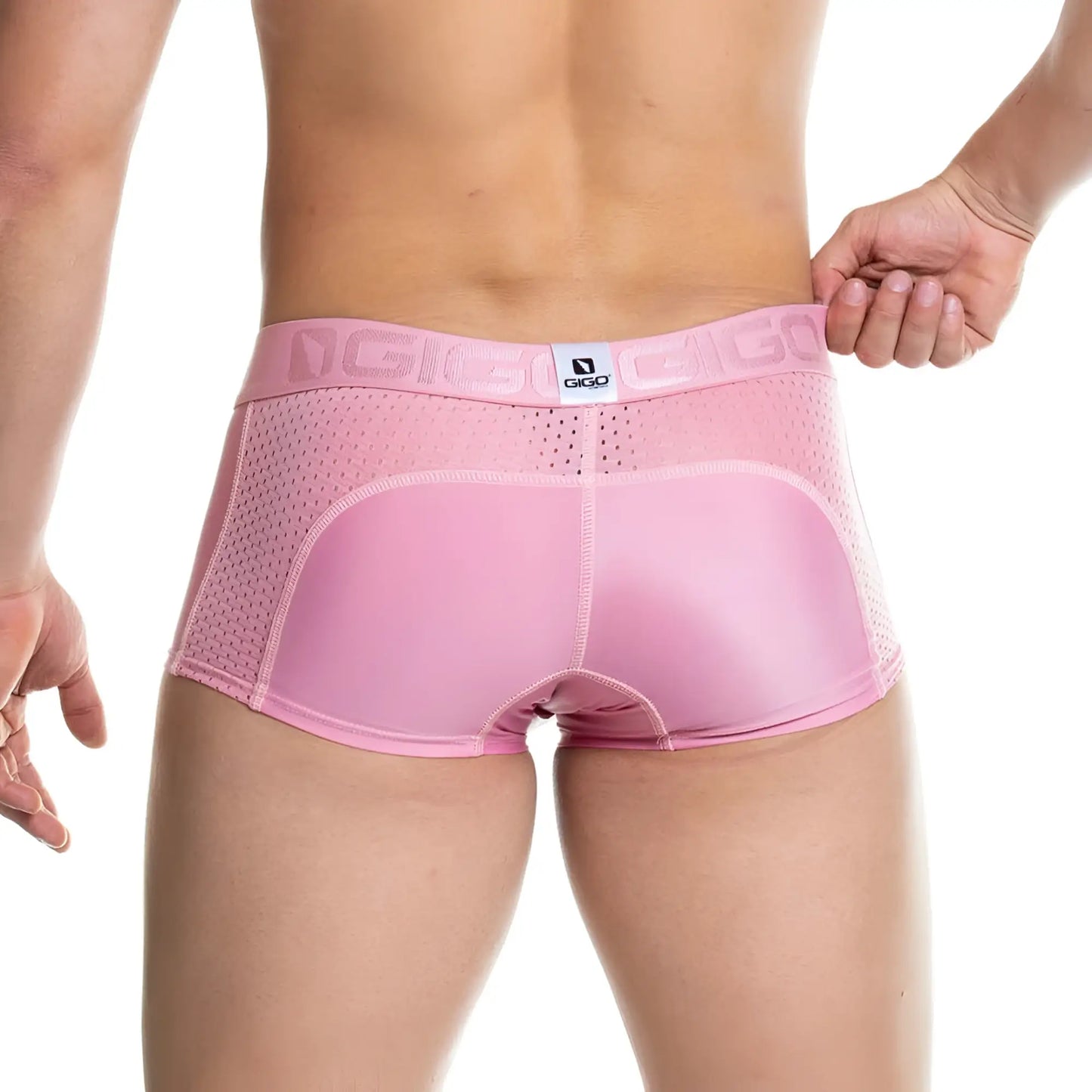 Pink gigi brand men’s briefs with a mesh back and solid nude front panel gigo prudence nude trunk