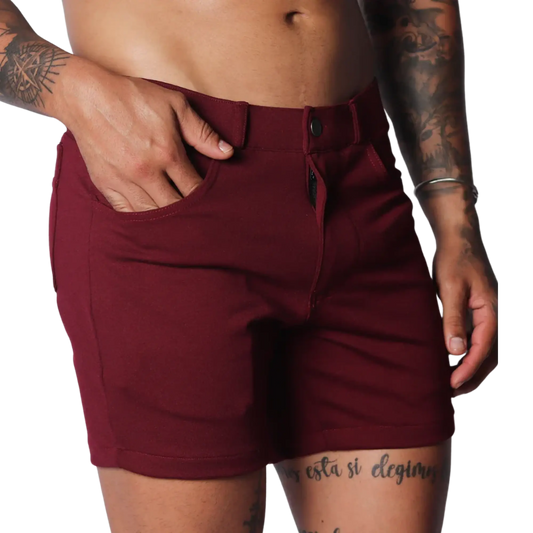 Wine-colored, short-length casual shorts in a smooth, stretch fabric with a button-fly closure and belt loops.