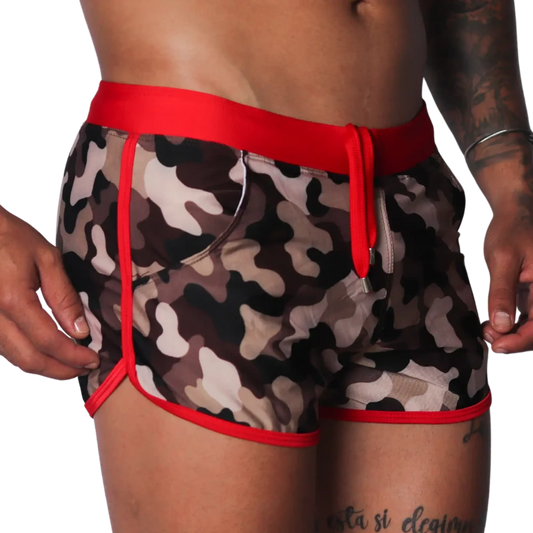 Men's camouflage print swim shorts with red trim, elastic waistband, and matching drawstring.