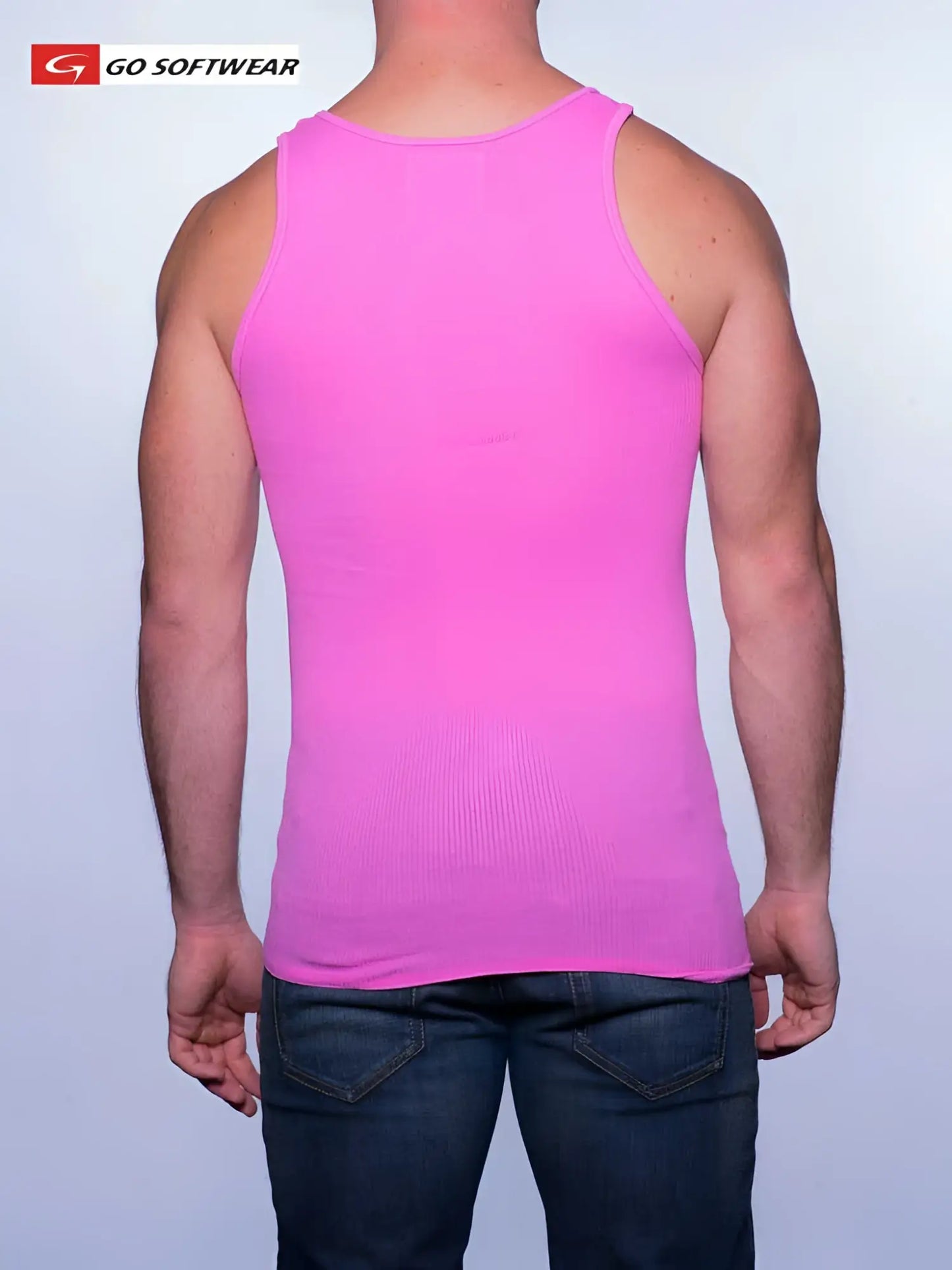 A vibrant deep pink ribbed tank top from Go Softwear made of soft fabric in size small