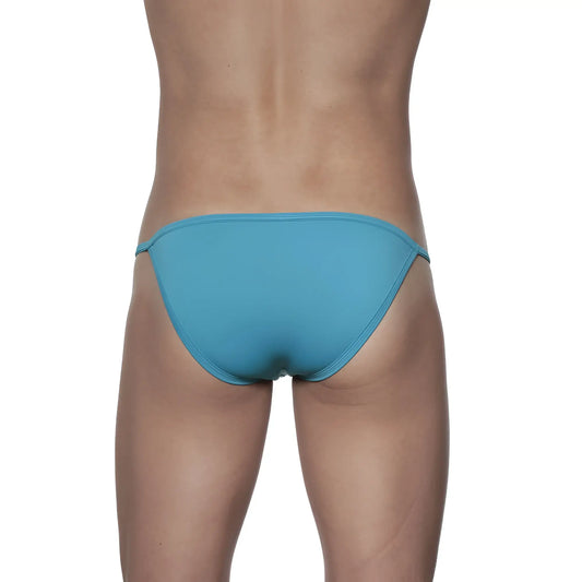 A sleek solid teal groovin string bikini solid fabric finish in a brief style swimsuit perfect for swimming