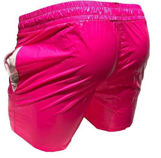 Vibrant fuchsia high gloss shorts with shiny reflective nylon finish and elastic waistband for comfortable wear