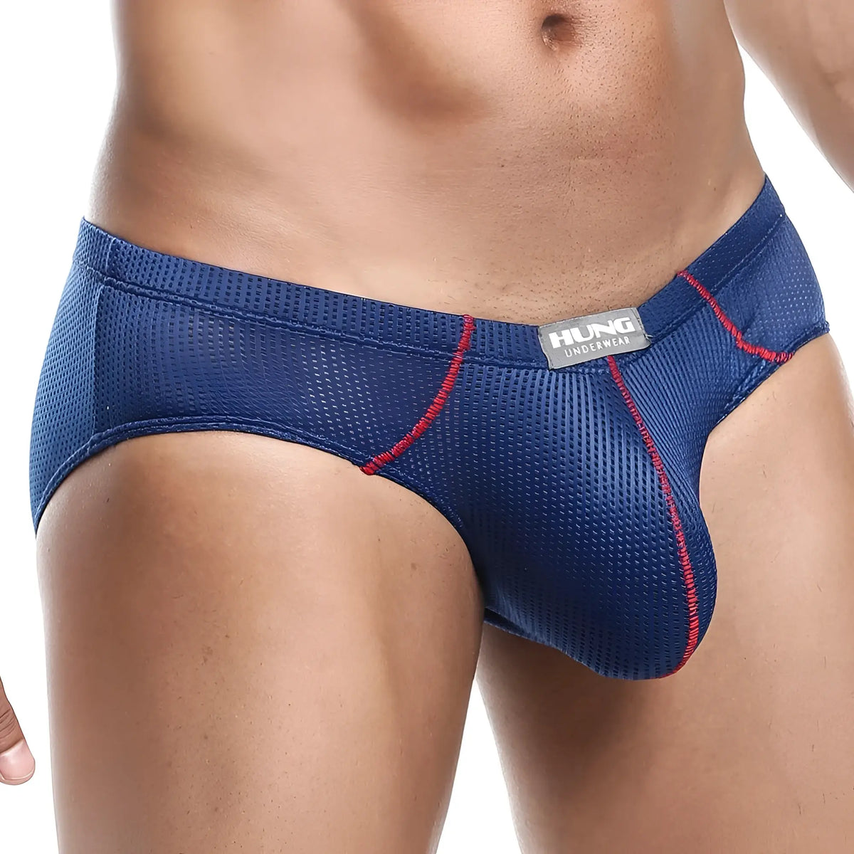 Blue mesh briefs with red stitching and hung underwear label from hung HGJ008 brief product line