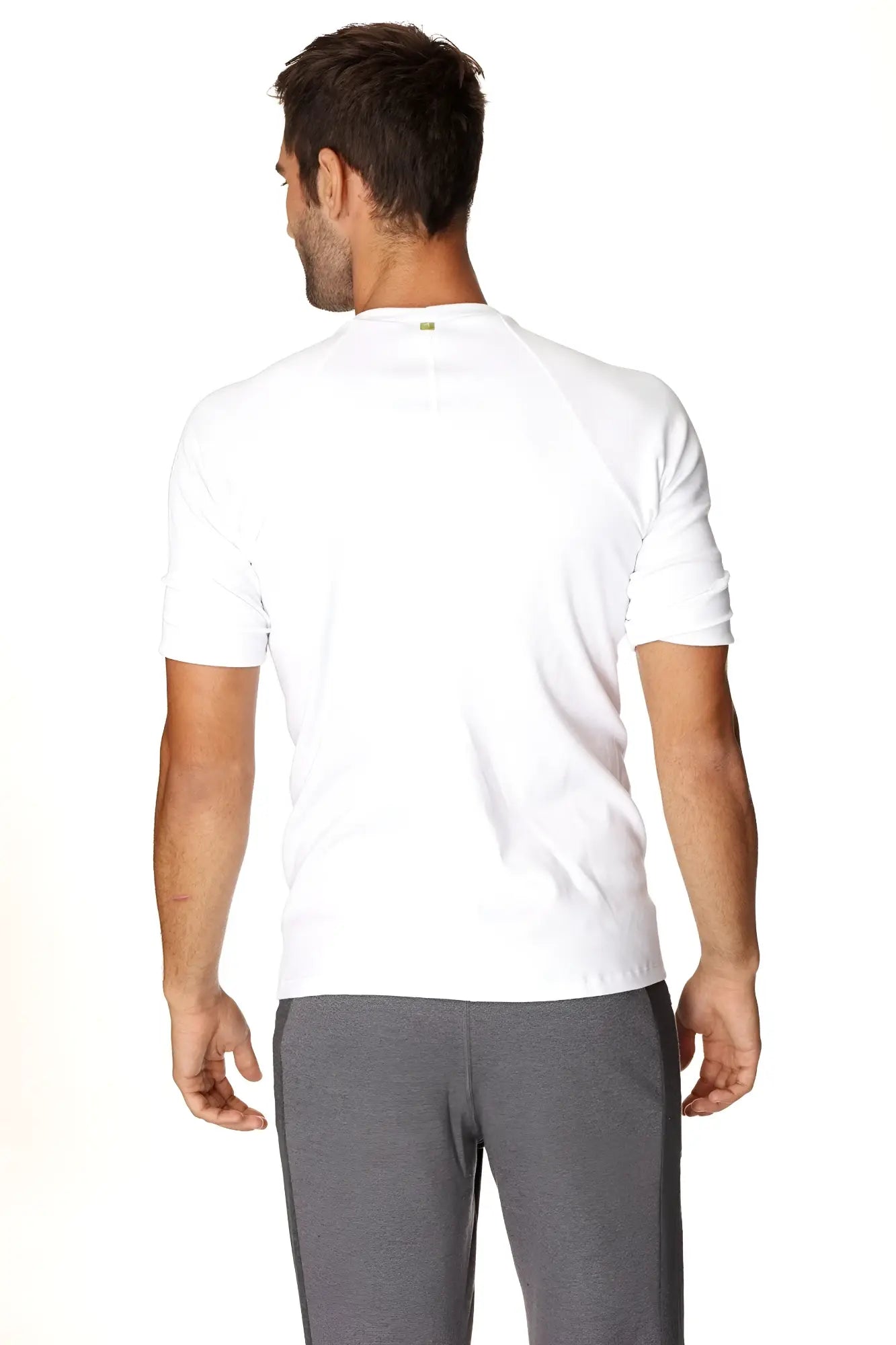White hybrid crew neck raglan tee with short sleeves and subtle ribbed detailing at the cuffs for athletic wear