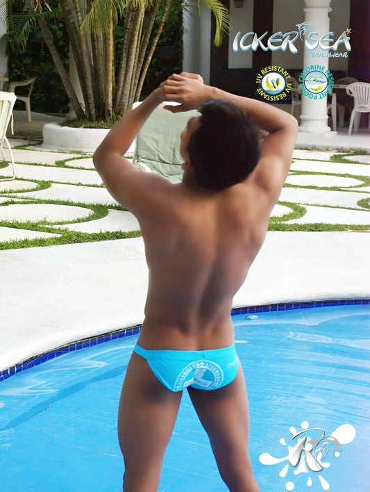 Bright blue icker sea lifeguard micro slip bikini swimwear showing the back with a white logo detail