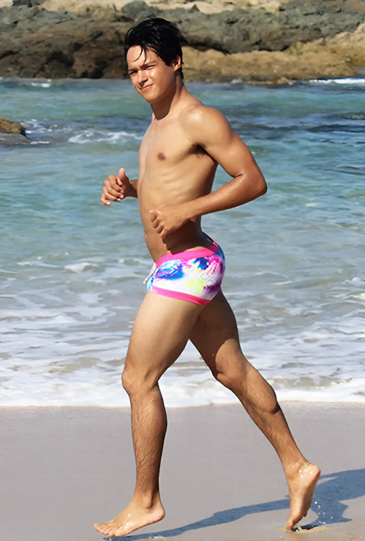 Icker Sea spring square cut trunk swimwear with vibrant tie-dye pattern and bright pink waistband in pink and blue