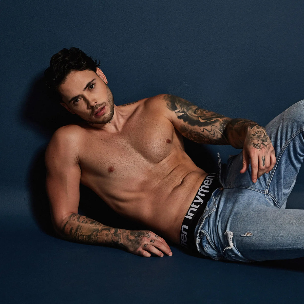 Black waistband with white intymen branding on a jockstrap for men by Intymen INE034