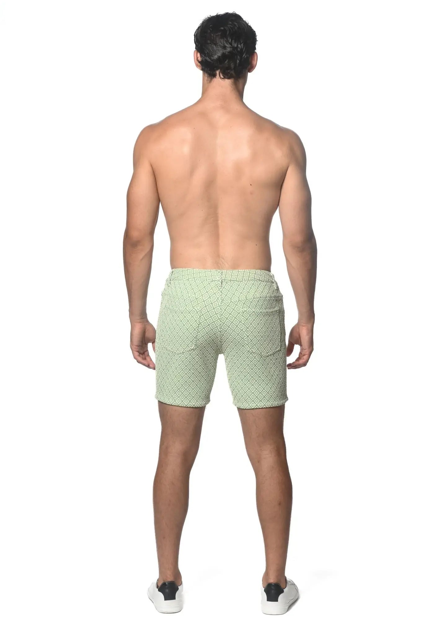 Light green jacquard printed stretch knit shorts with a subtle geometric pattern for casual wear
