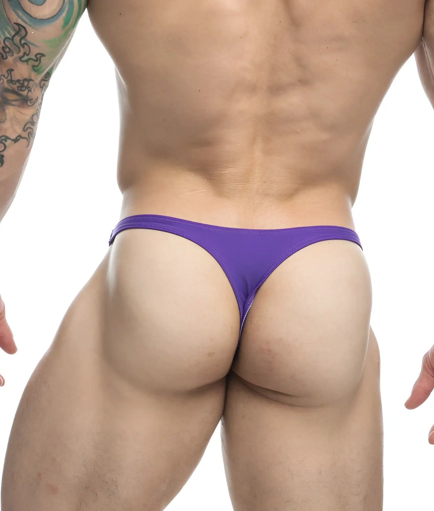 Purple stretchy fabric thong showing the back side of the Justin + Simon classic tanga underwear product