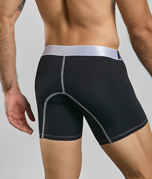 Black malebasics microfiber boxer brief with silver waistband and matching stitching details in front view