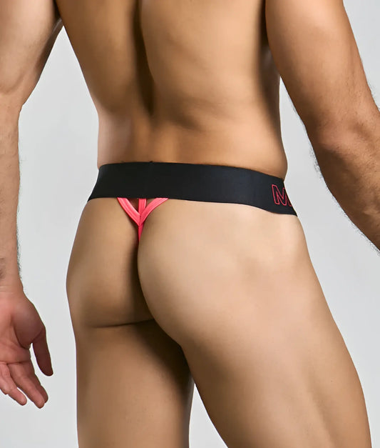 Malebasics neon thong in black and pink with bold angular design and subtle logo on the waistband visible on back side