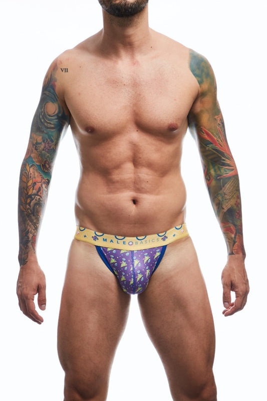 Man wearing colorful men's MaleBasics jockstrap underwear on a white background