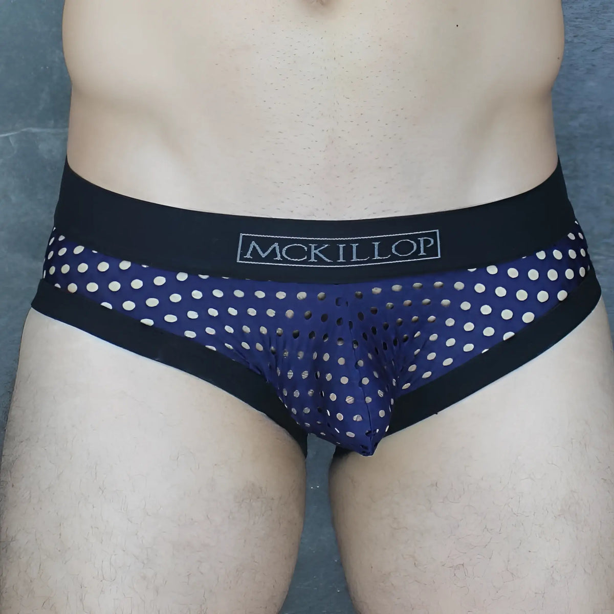 Dark blue mesh briefs with white polka dots and black elastic waistband featuring mckillop logo Mckillop MCKOBHQ Brief