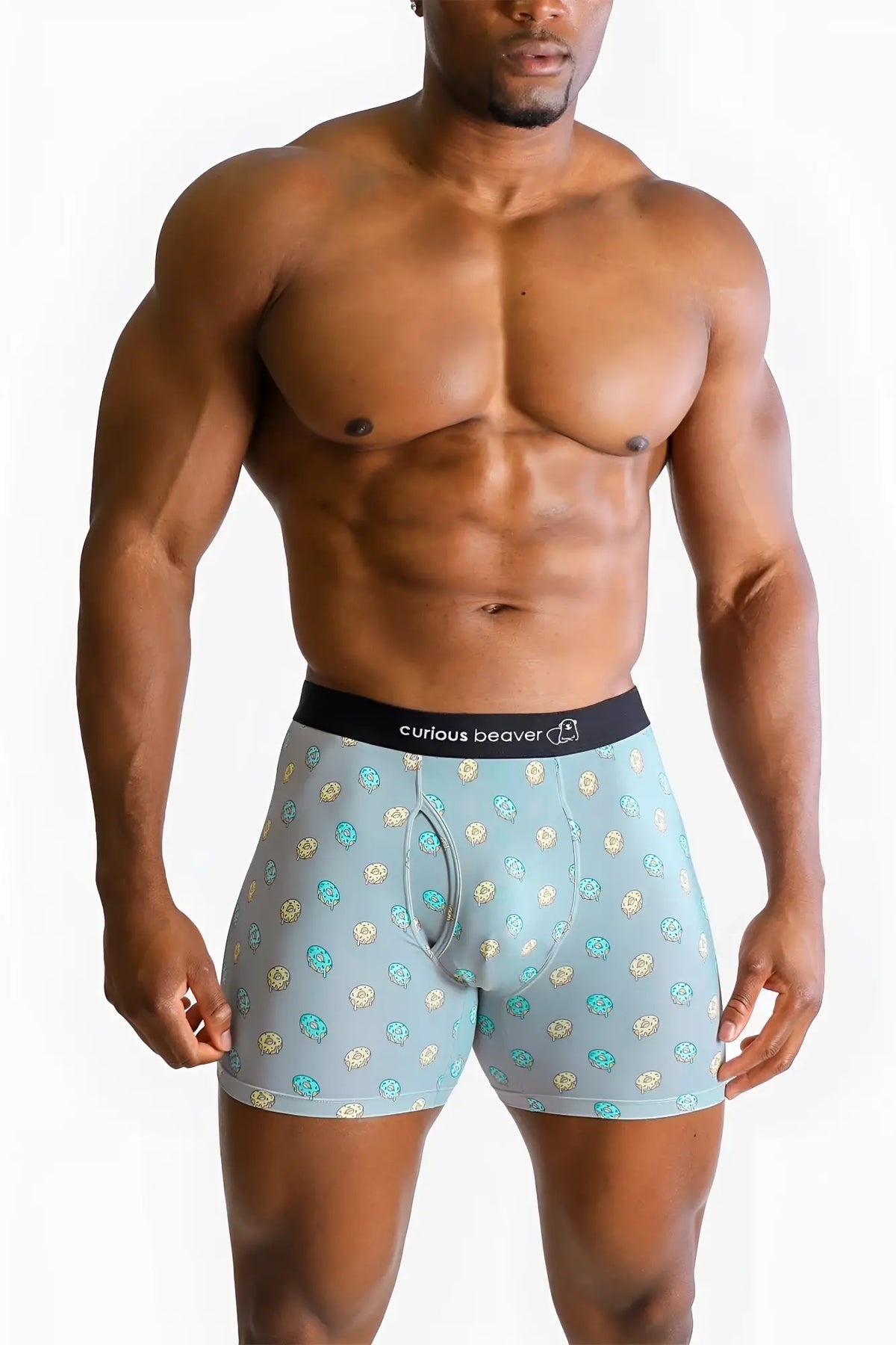 Men’s light blue boxer briefs with teal and gold cartoon beaver pattern and black curious beaver waistband