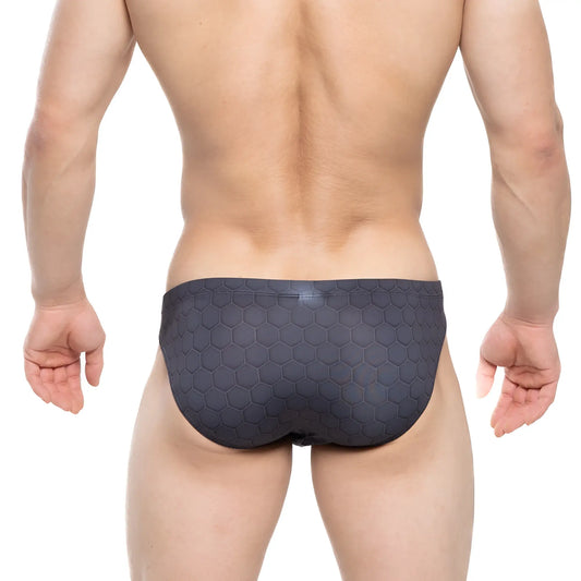 Dark gray swim trunks with a textured hexagonal pattern from metromalewear armour bikini 5103-m41 collection