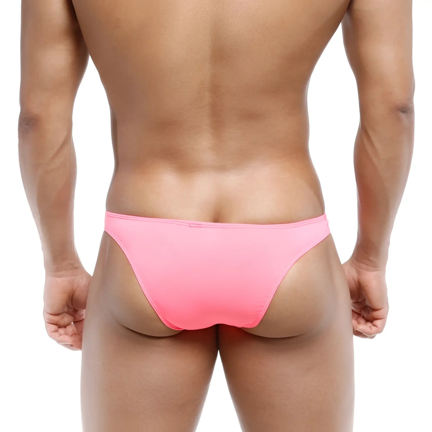 A vibrant pink form-fitting brief-style swimsuit from MetroMaleWear bulge capri bikini fuchsia 6104-02