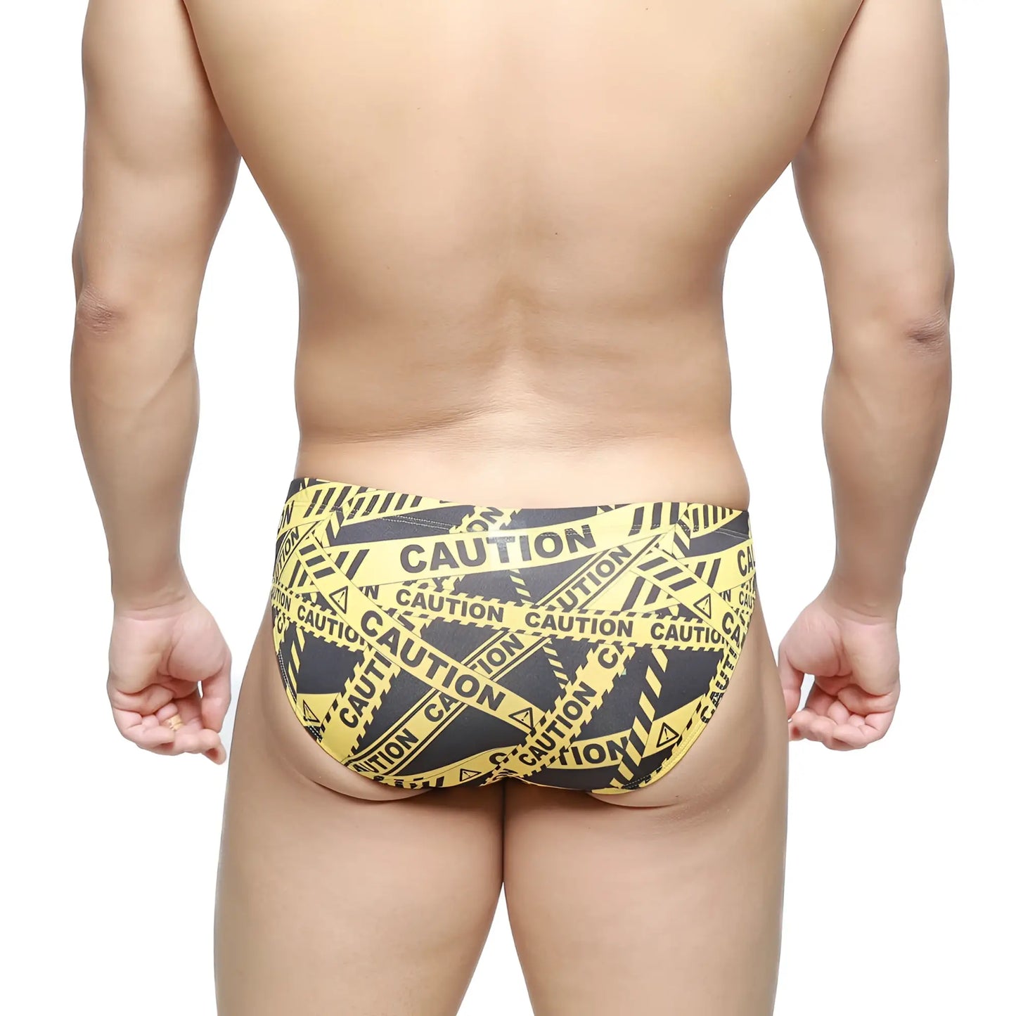 MetroMaleWear caution bikini swim trunks in yellow and black caution tape pattern for bold beachwear style