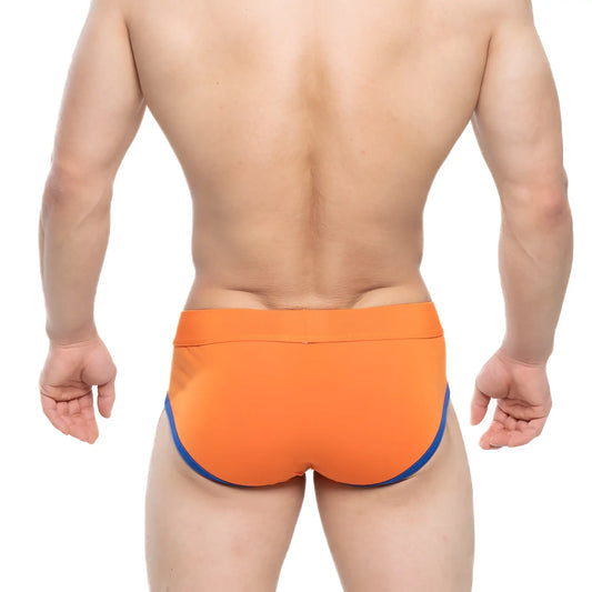 Bright orange MetroMaleWear Ciclerut Brief 9004-24 swim trunks with contrasting blue side trim for men