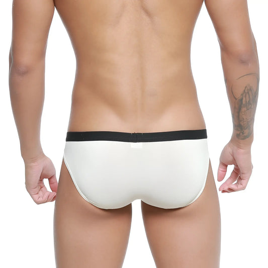 Cream-colored latex MetroMaleWear expose brief nude 2207-01 with black elastic waistband for comfortable wear