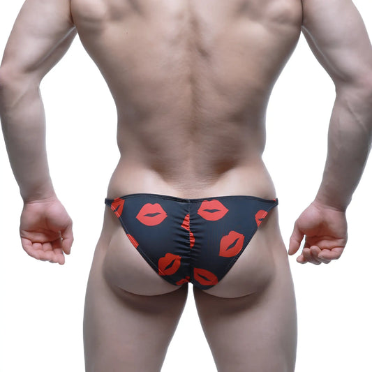 Black MetroMaleWear Fantasy Bikini Kiss 6116-62 swim trunks with bold red lipstick print pattern
