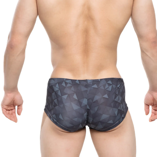 Dark gray swim trunks by metromalewear featuring a geometric triangle pattern for stylish beachwear