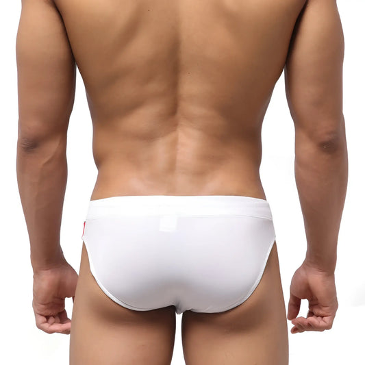 White briefs metro male wear french swim brief 4946-32 with smooth form fitting design and small red logo on left side