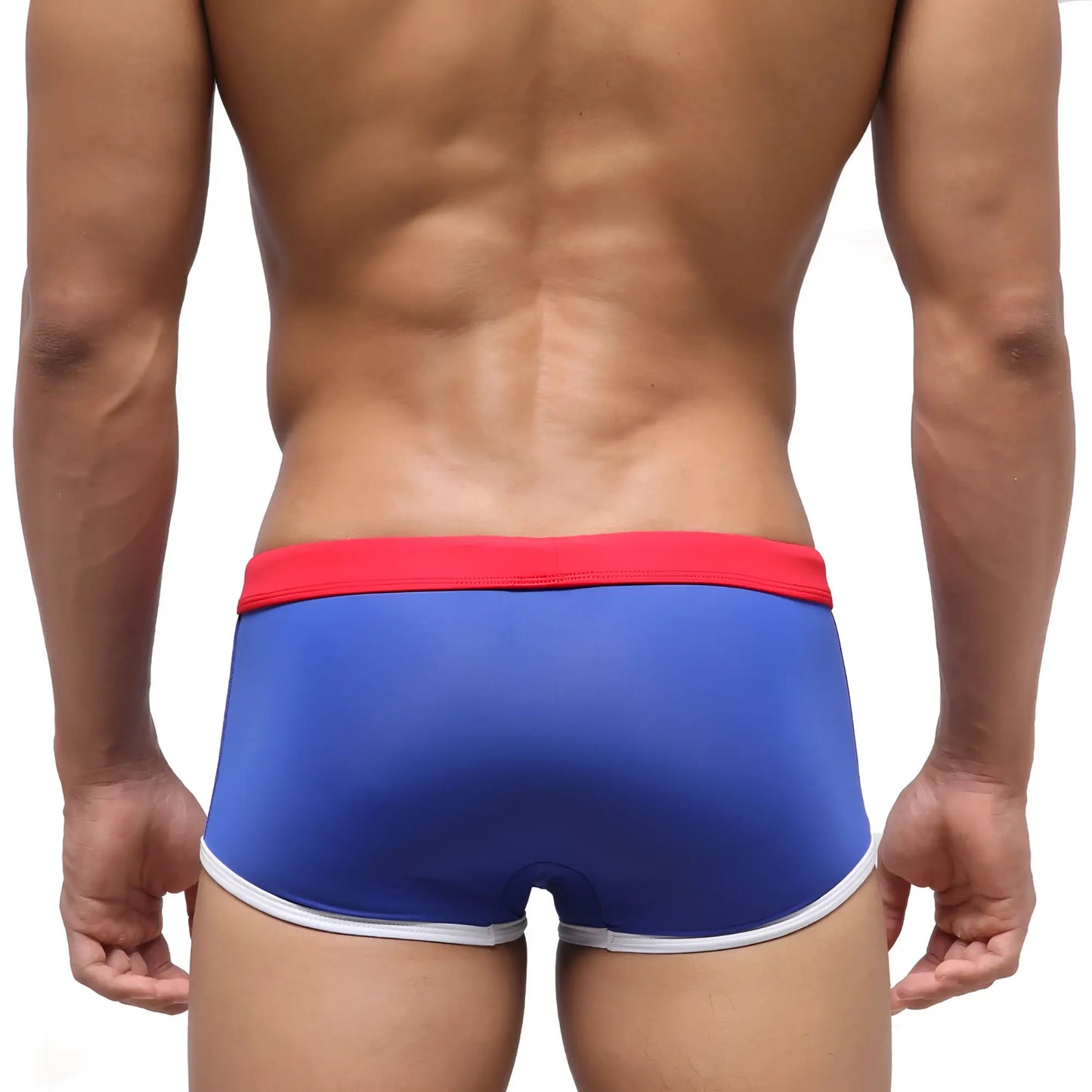 Blue swim trunks with red waistband and white trim from metromalewear fresco swim trunk royal blue 4944-18