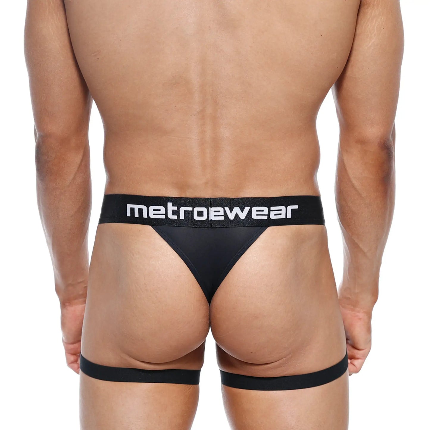 Black metrowear garter thong with wide waistband and leg straps designed for comfortable metrowear fashion