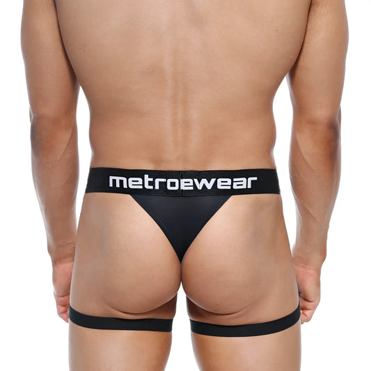 Black metrowear garter thong with wide waistband and leg straps designed for comfortable metrowear fashion