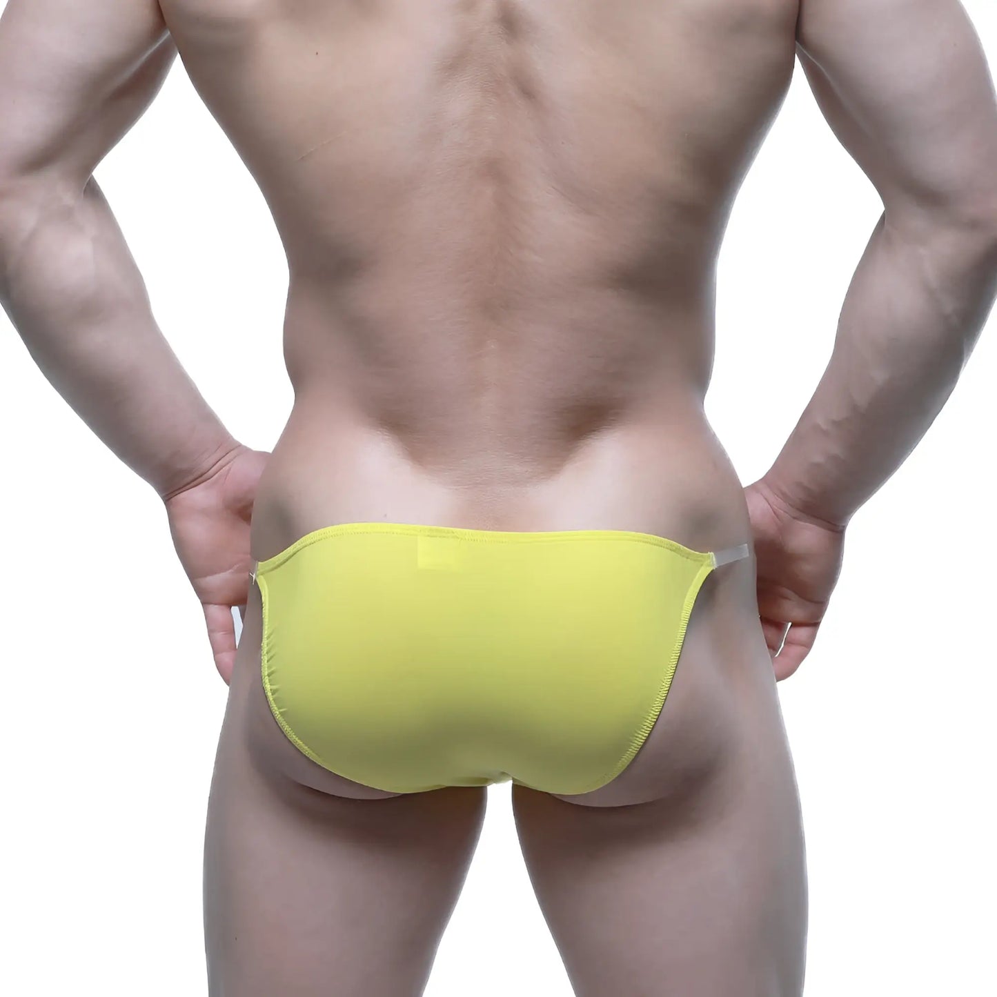 Bright yellow MetroMaleWear Invisible Bikini 3704-15 swim trunks with a sleek minimalist design and form-fitting style
