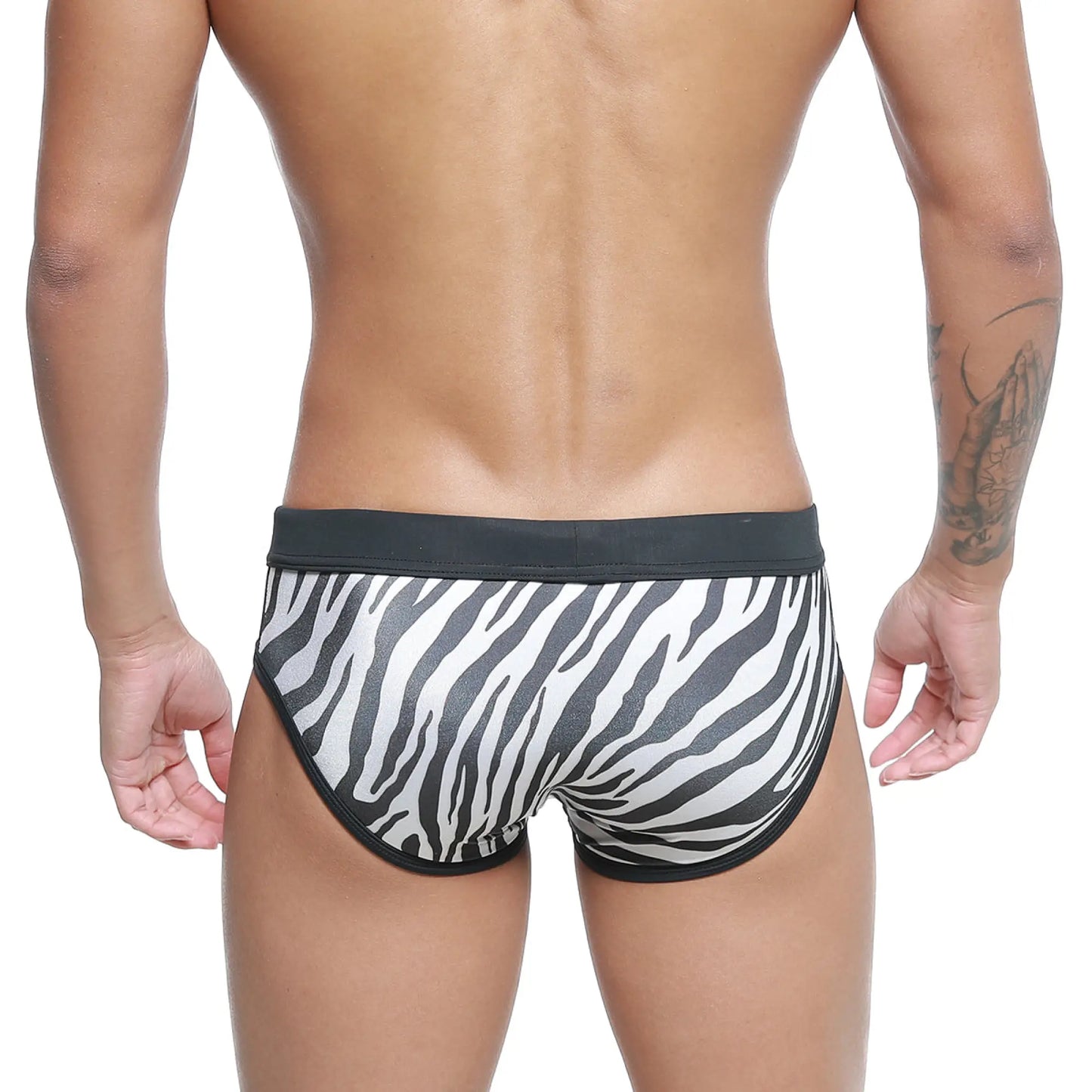 Black and white zebra-striped men’s briefs with a solid black waistband metroMalewear Kenya Swim Brief 4916-30