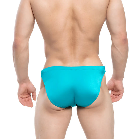 A vibrant turquoise metroMalewear lagoon swim bikini 4987-08 with form-fitting smooth fabric for stylish swimwear