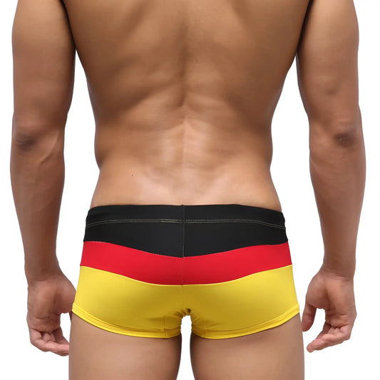 MetroMaleWear Lycos swim trunk in German flag colors black red and yellow striped design for men