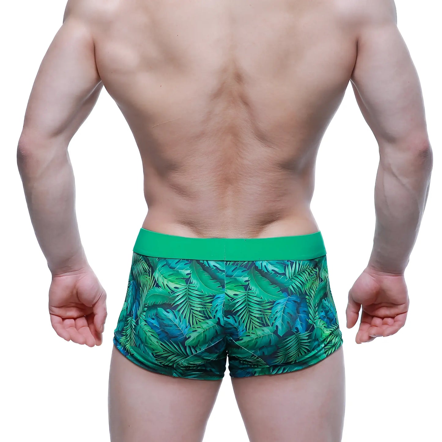 MetroMaleWear Maintenant boxer brief swim trunks with green tropical leaf pattern and solid green waistband