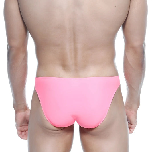 Bright pink sleek form-fitting swim trunks by MetroMaleWear designed for enhancing max bulge look in fuchsia color