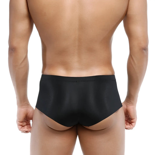 Black sleek form-fitting briefs with a smooth satin-like finish metroMalewear naked trunk 6313-20
