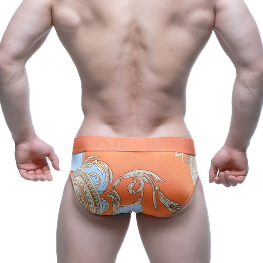 Orange men’s briefs with blue and gold ornate pattern by metro malewear model narangja brief 5203-24
