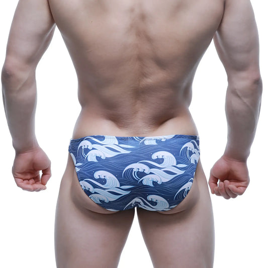 Blue swim trunks metroMalewear pado lowrise bikini 6115-66 featuring a white wave pattern for beachwear