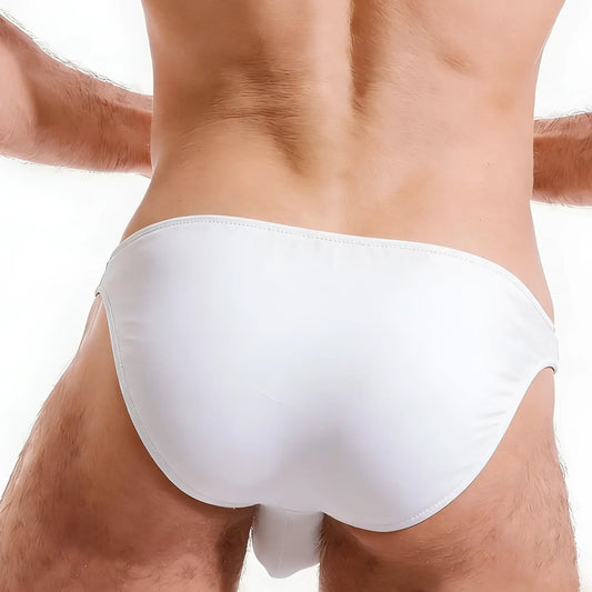 White smooth-textured cotton swim trunks with a sleek minimalist design from MetroMaleWear Perfect Scene collection