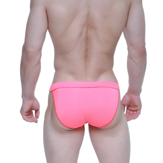 Bright pink MetroMaleWear Plano bikini swim trunks with snug fit and matching side seam zipper detail
