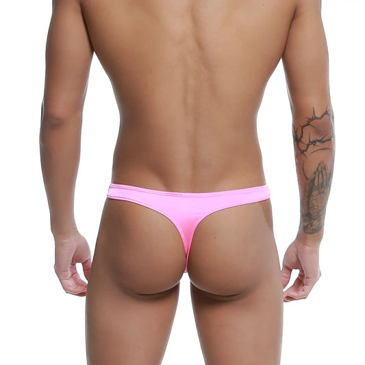 A vibrant pink metro malewear pouch thong made of smooth stretchy fabric with a form-fitting design