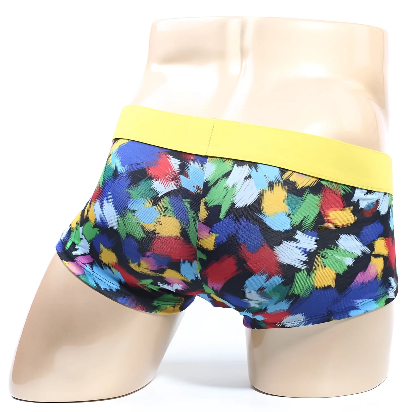 Colorful abstract brushstroke men’s boxer briefs with a bright yellow elastic waistband.