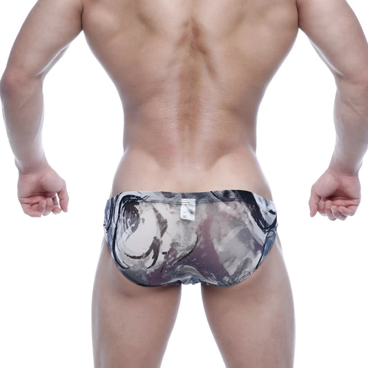 Black and gray abstract swirl-patterned mesh swim trunks metroamalewear vasco hip brief grass 5103-71 front view