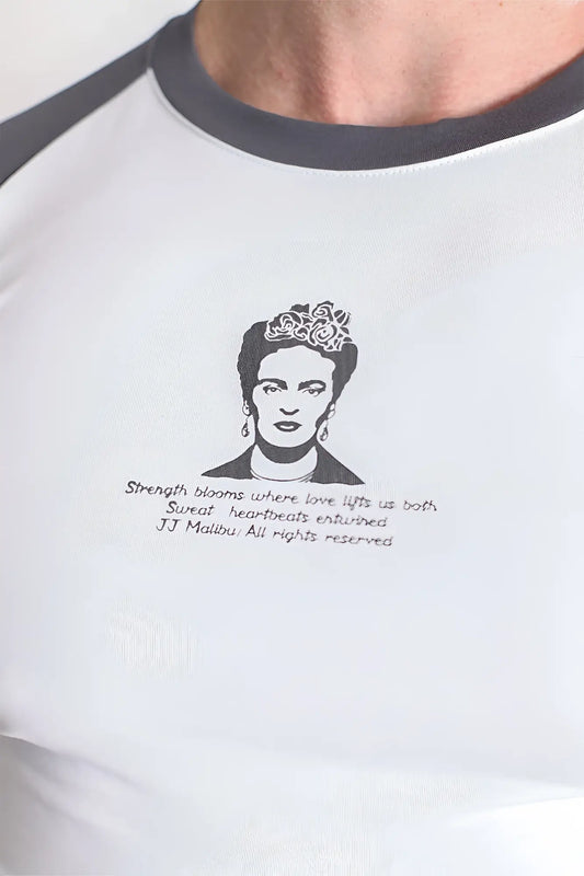 Muscle-fit crop tee white raglan sleeve with black trim featuring frida kahlo graphic and inspirational quote