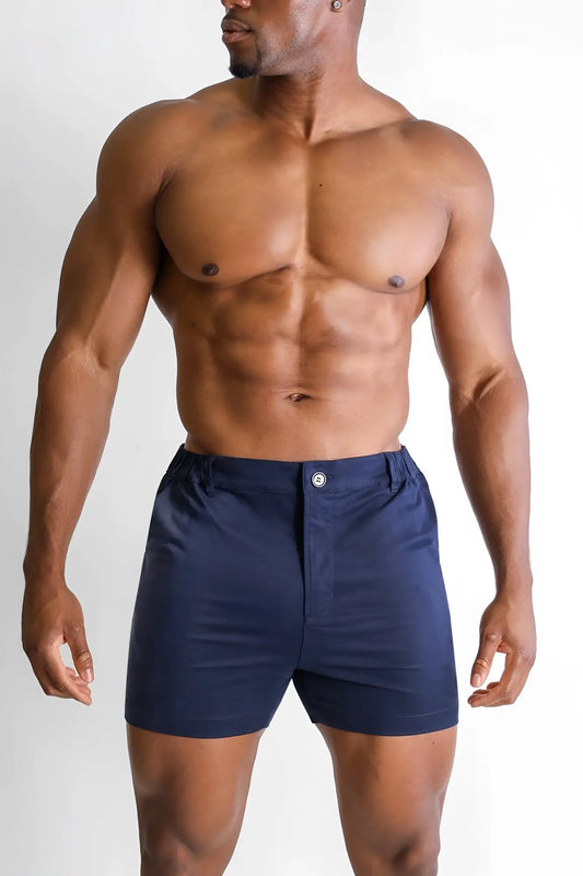 Muscle-fit men’s 4 inch navy cotton chino shorts with button closure and belt loops in stretchy fabric