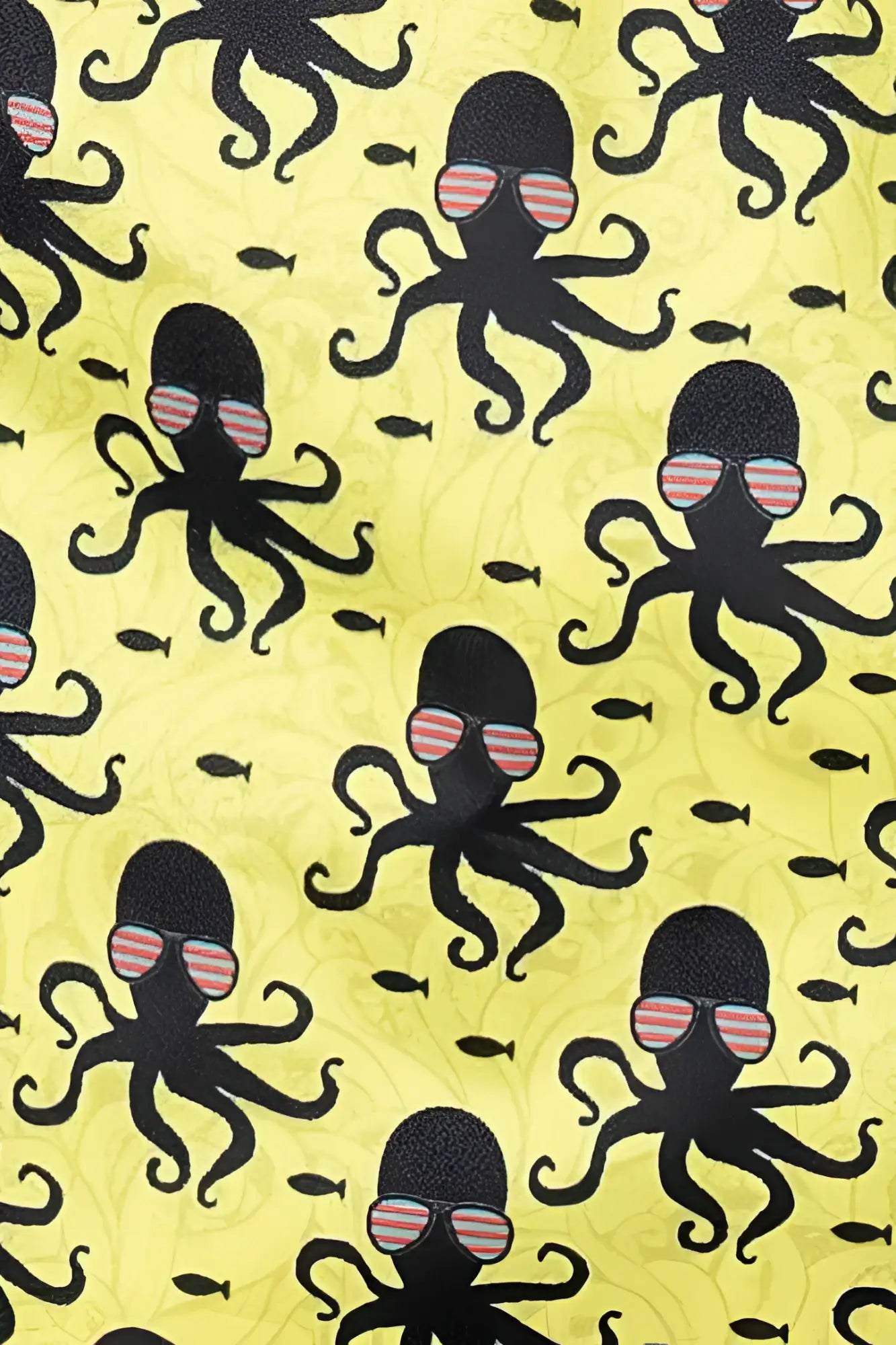Yellow octopus print swim short fabric with black octopuses wearing striped sunglasses and small fish pattern