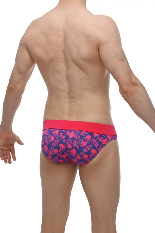 PetitQ brief Blaru tropical hearts men’s briefs with vibrant pink and navy heart leaf pattern and solid red waistband