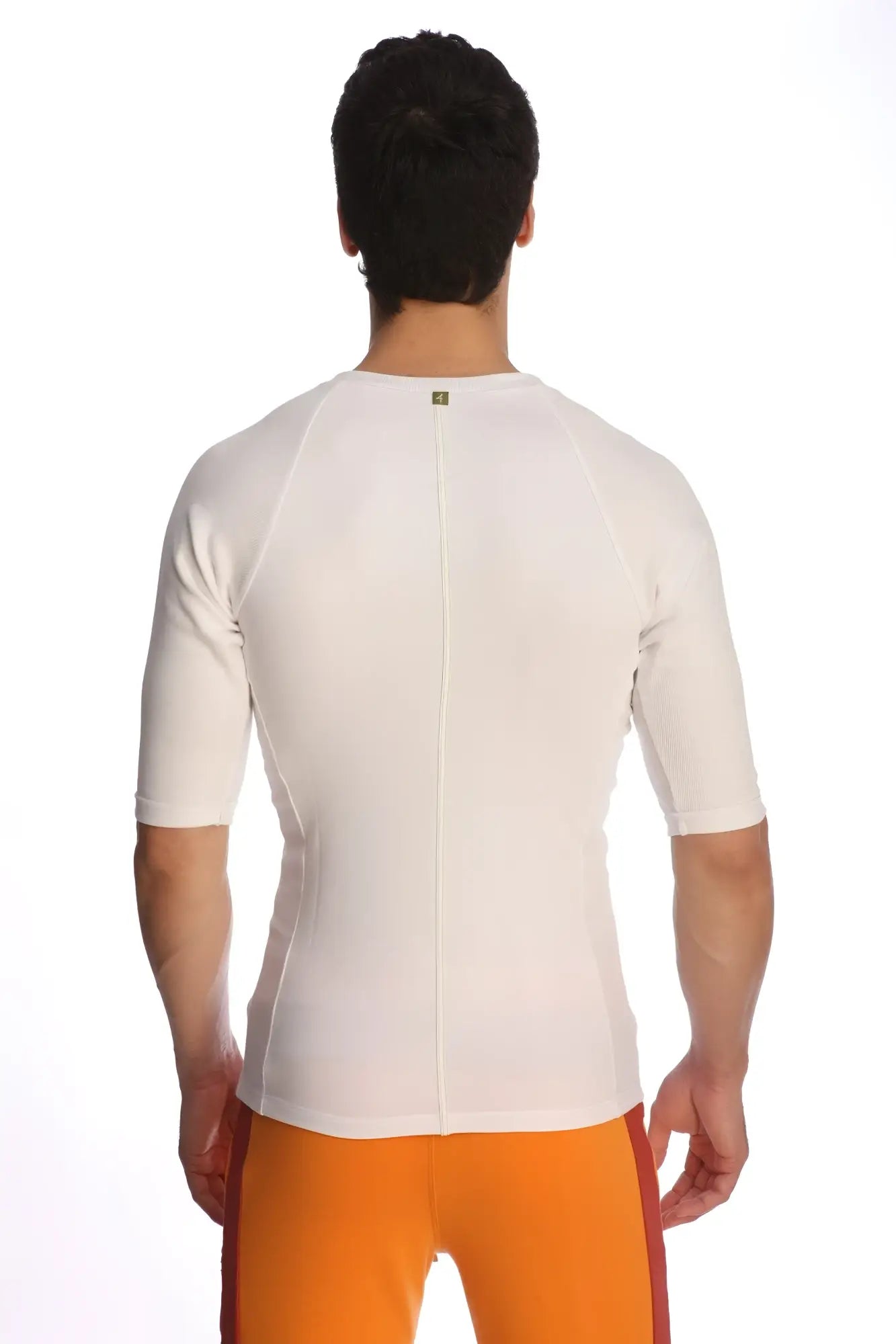 White short-sleeved raglan virtual crew neck shirt showing back with central zipper and subtle seam detailing