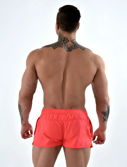 Roberto Lucca solid coral red swimwear shorts with elastic waistband and side pockets size L in bright coral color